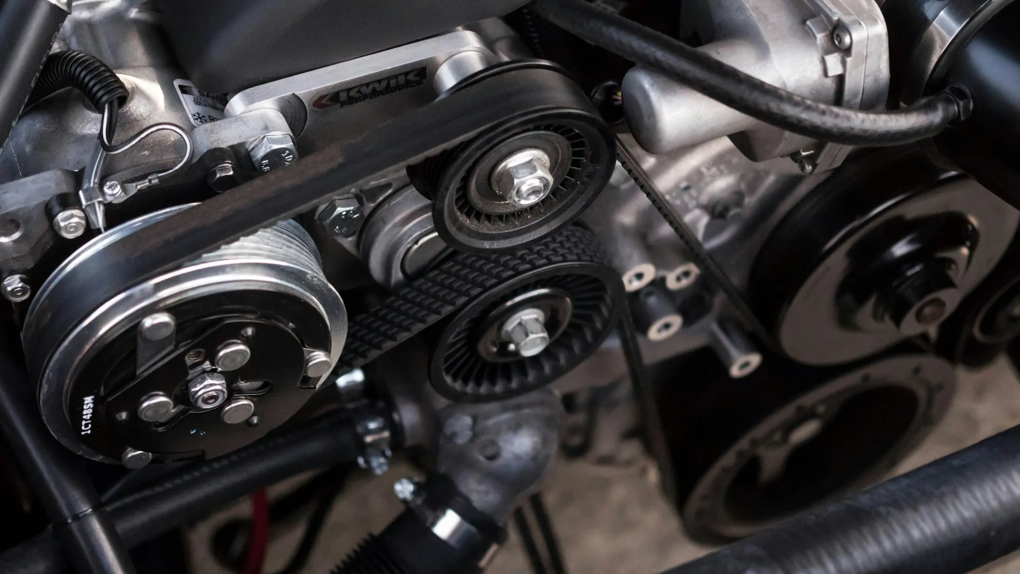 Engine pulley and belt detail viewed up close
