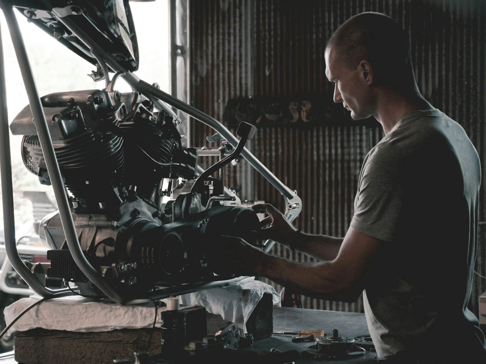 Mechanic working on an engine in a workshop